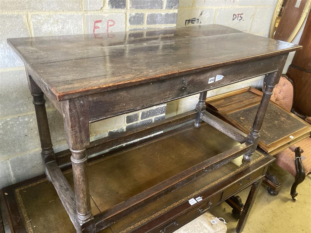 An 18th century oak side table, fitted with a drawer, width 121cm, depth 57cm, height 74cm